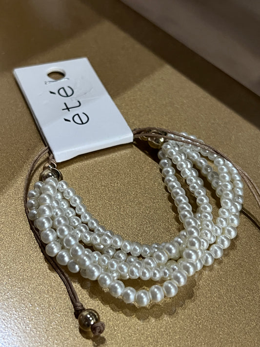 Multi-bead white bracelet