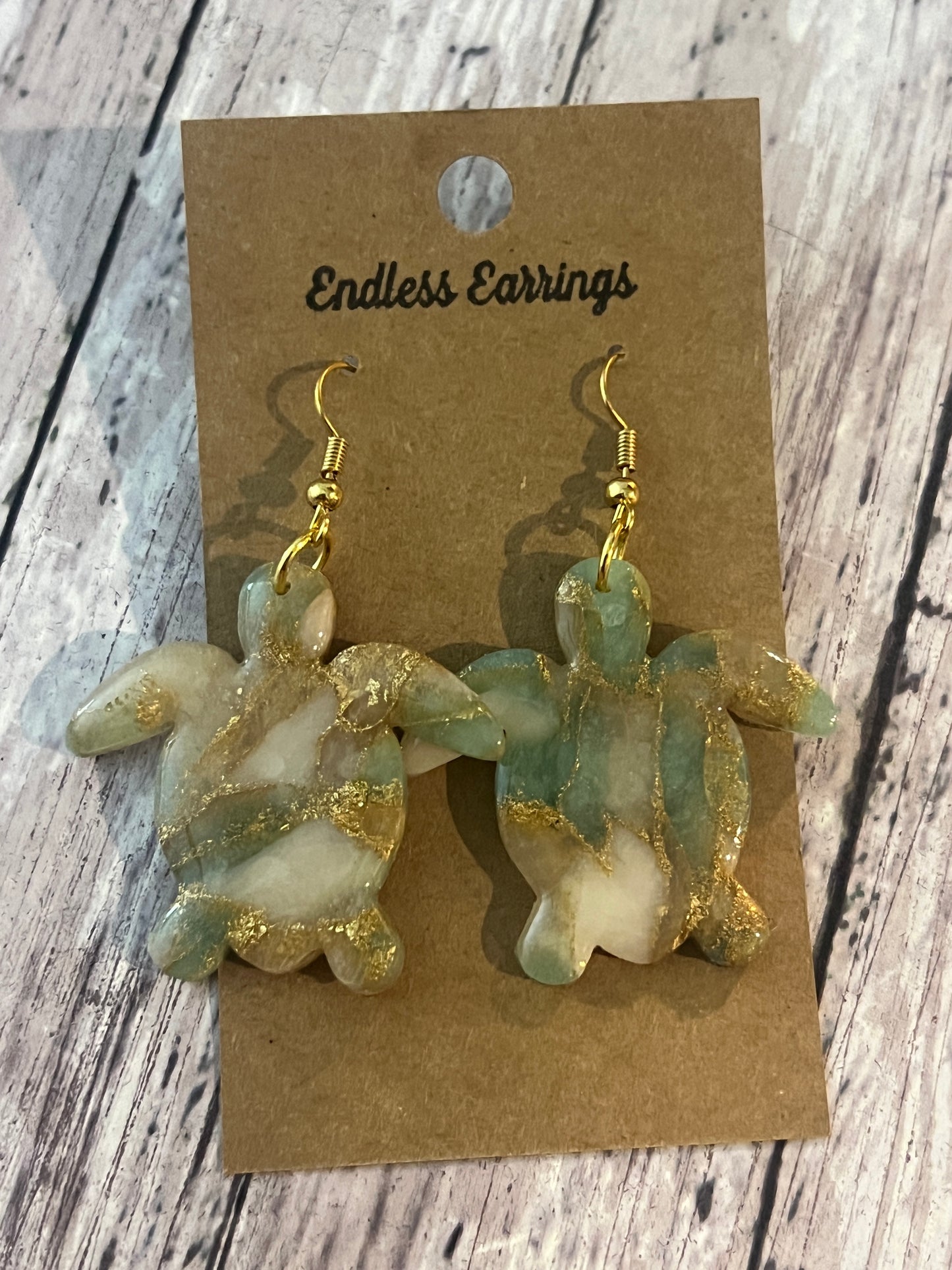 Turtle dangle earring