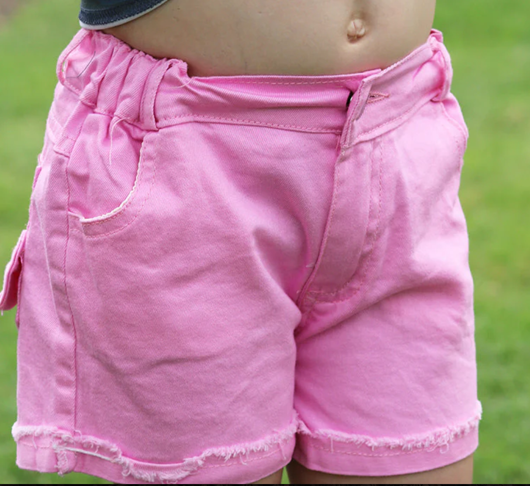 Pink denim shorts with bow detail on back