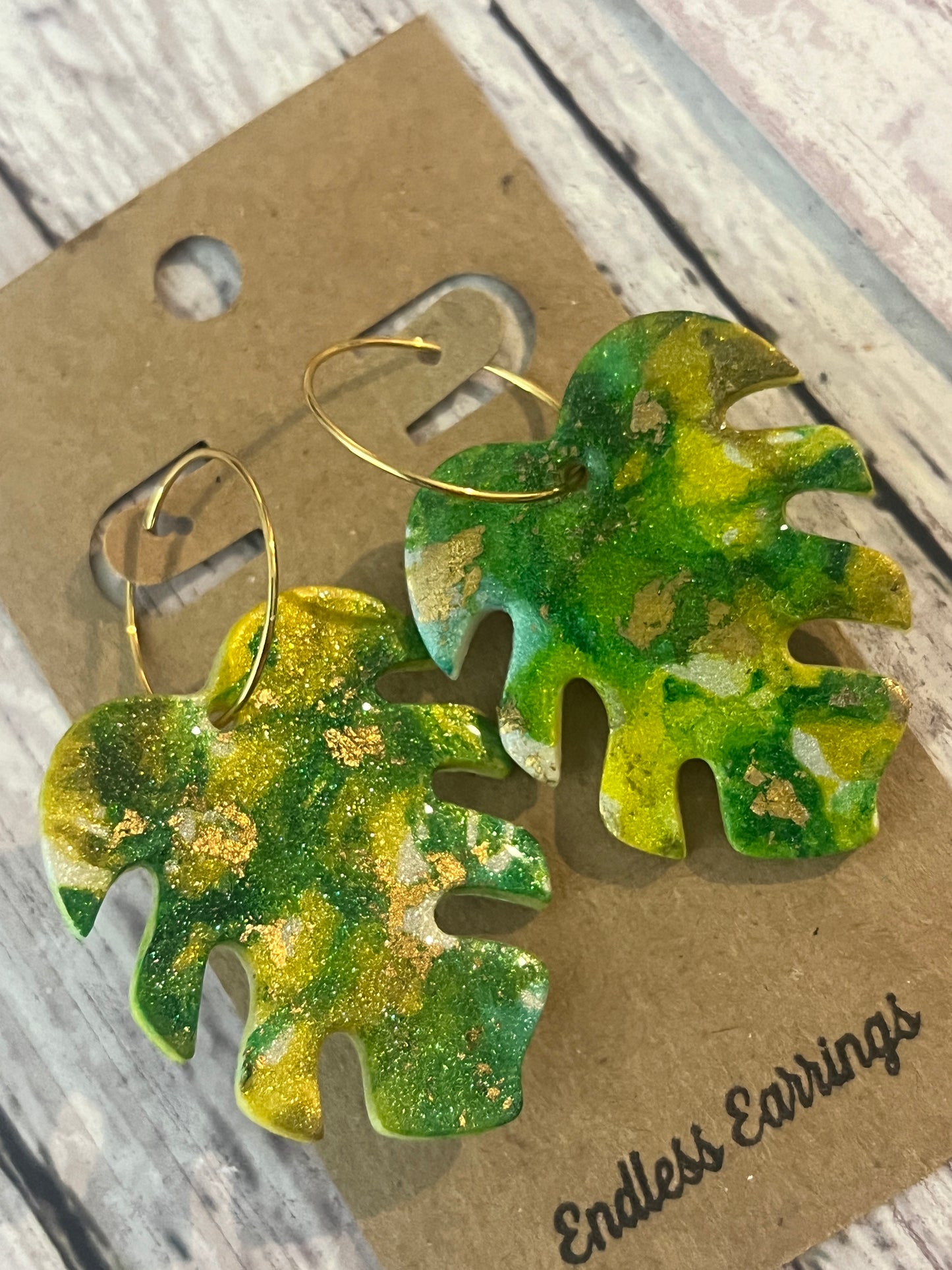 Green with gold accents lead dangle earring