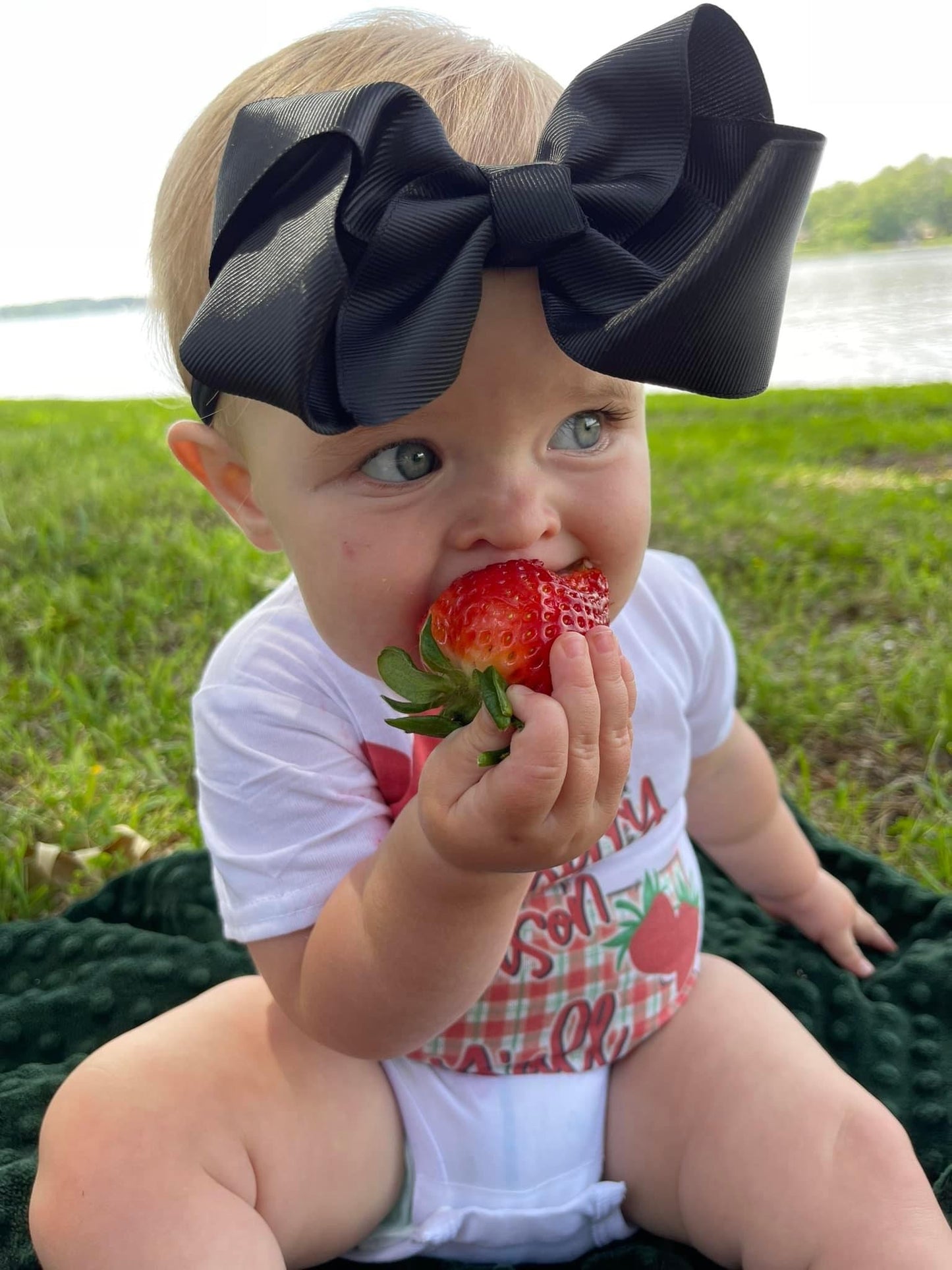 Louisiana State strawberry onsie