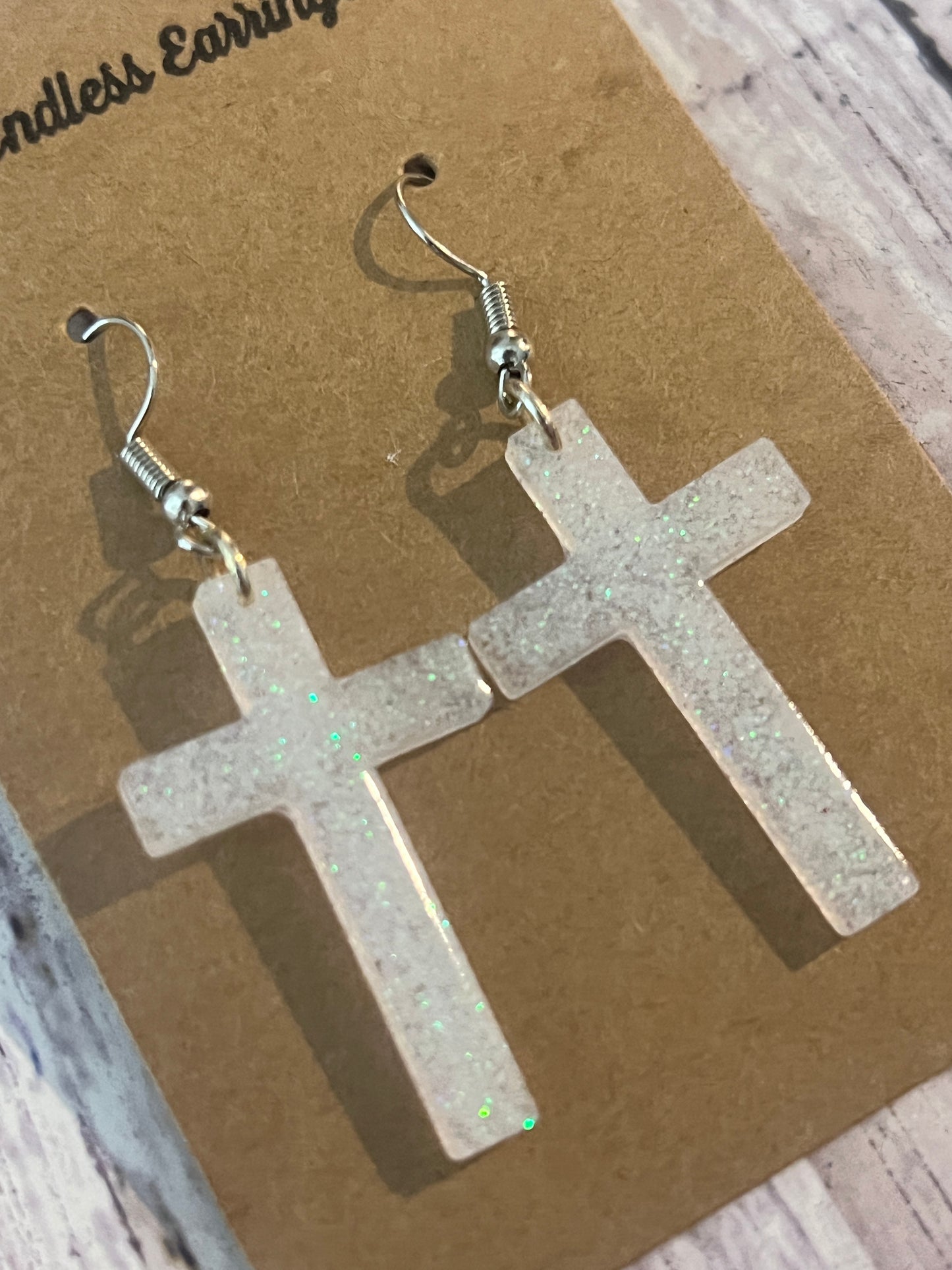 Cross dangle earrings