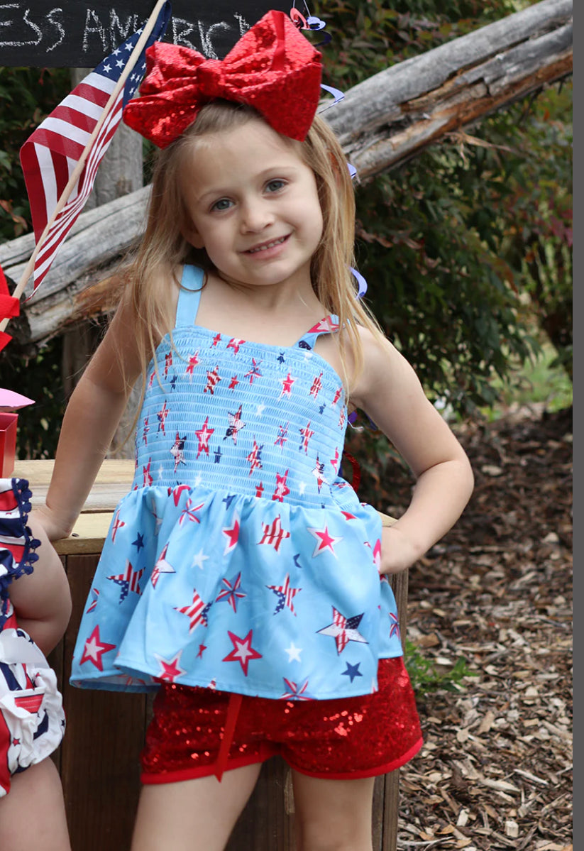 PATRIOTIC PRINTED RUFFLE TANK TOP & SEQUINS BOTTOMS.