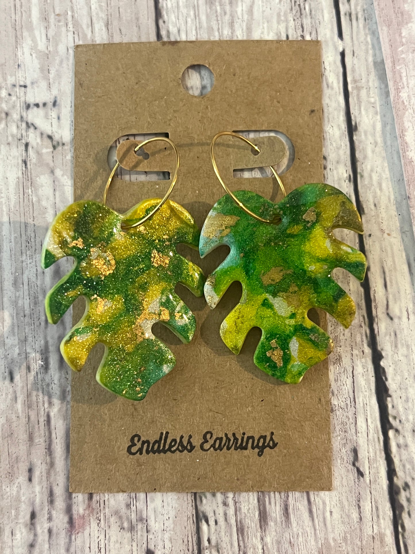 Green with gold accents lead dangle earring