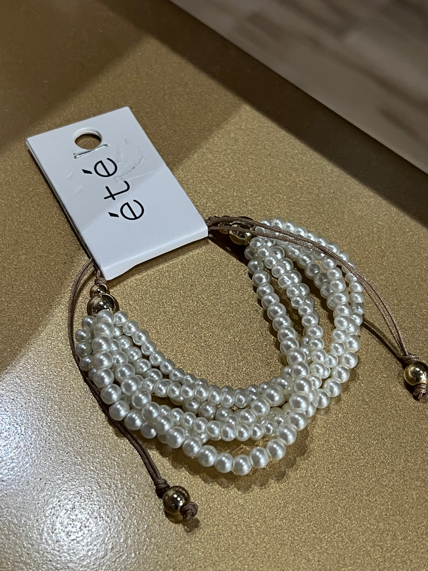 Multi-bead white bracelet