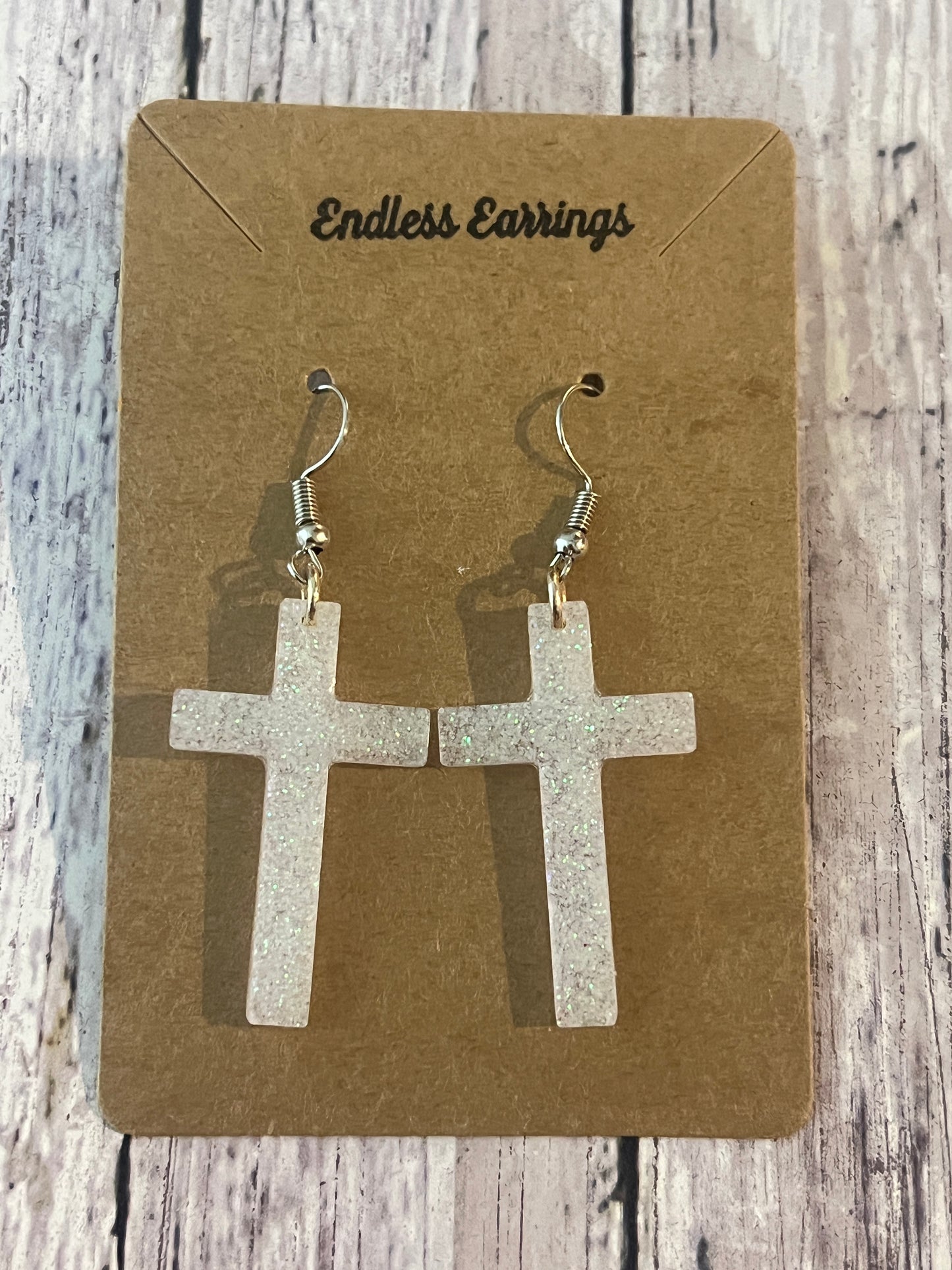 Cross dangle earrings